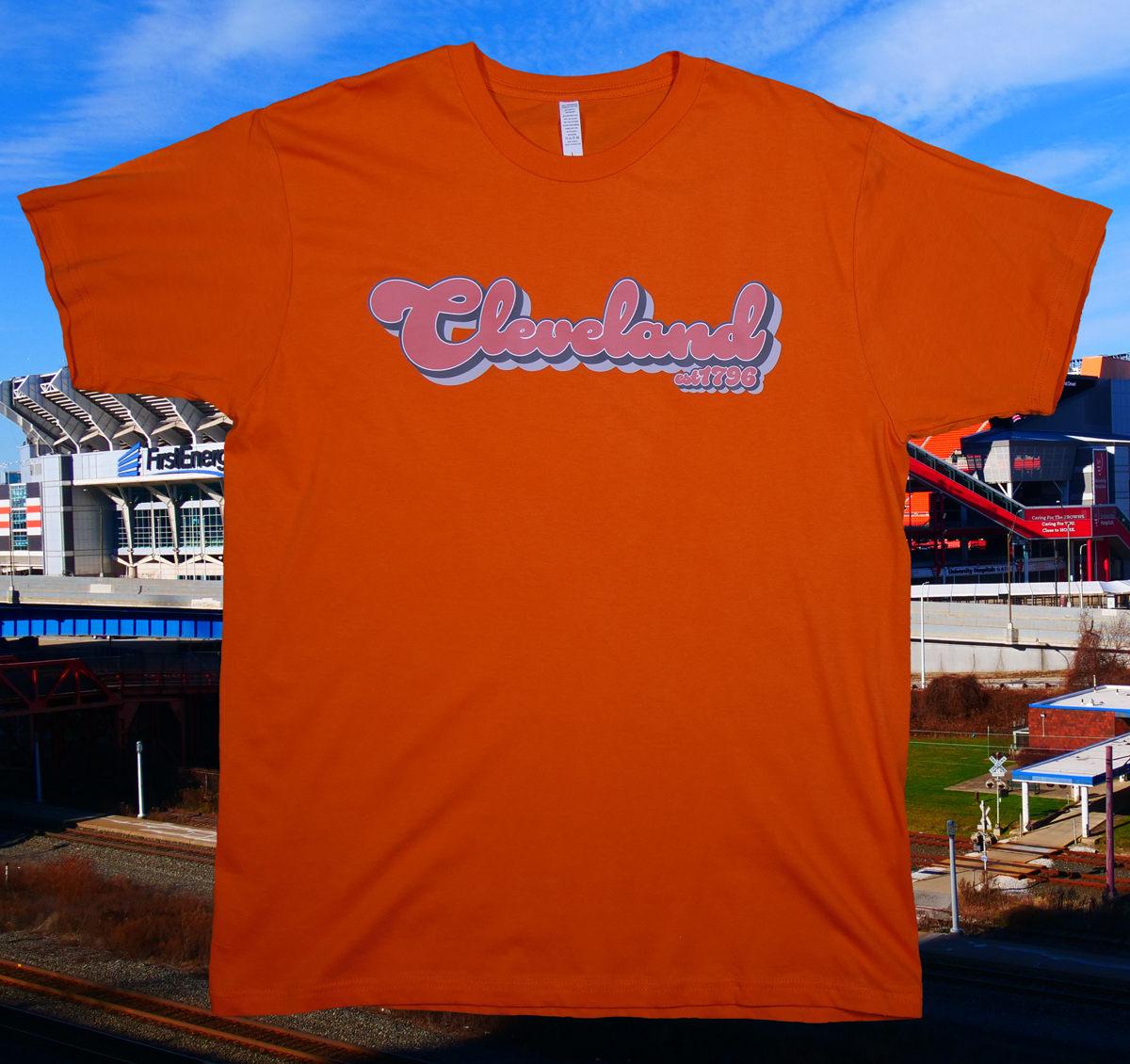 Cleveland 1796 graphic tee, orange text on orange tee.