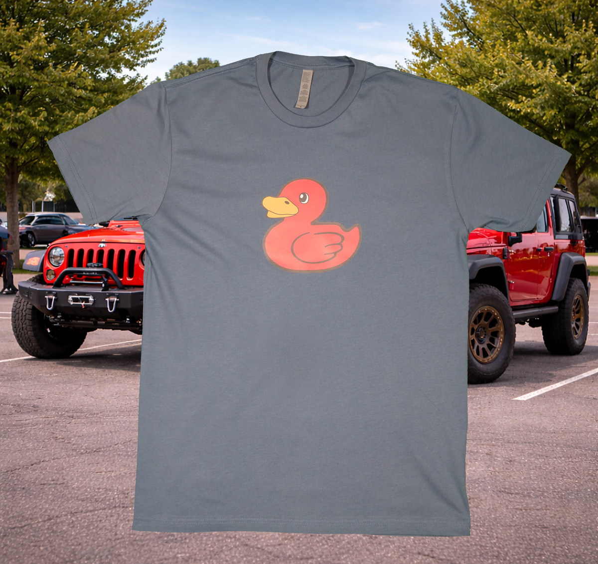 Single large firecracker duck color wave on a blue jean tee.